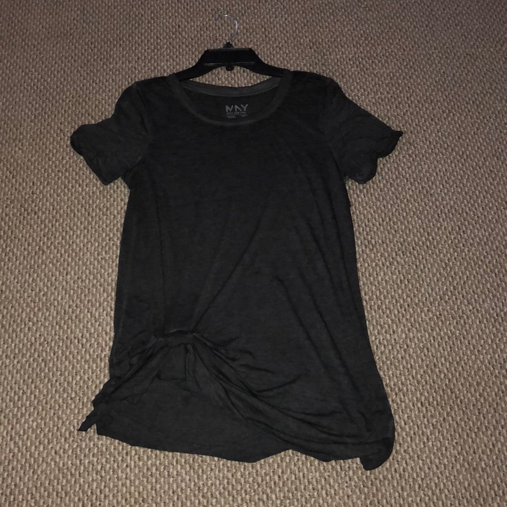 Charcoal shirt tucked in one corner!